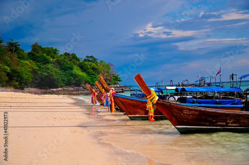Traditional boats at pristine thailand beach