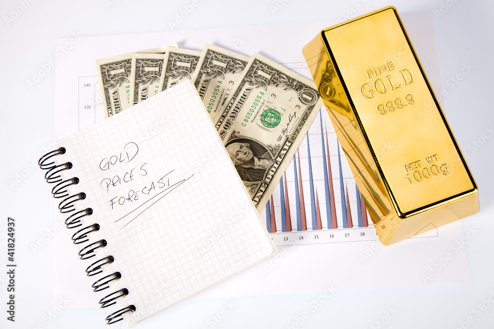 Photo of gold bars on graphs and statistics