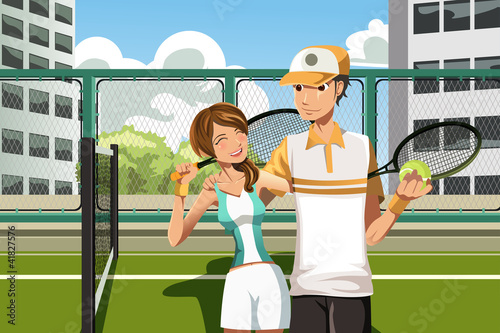 Couple playing tennis