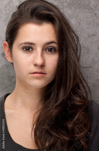 Attractive young brunette portrait with long hair