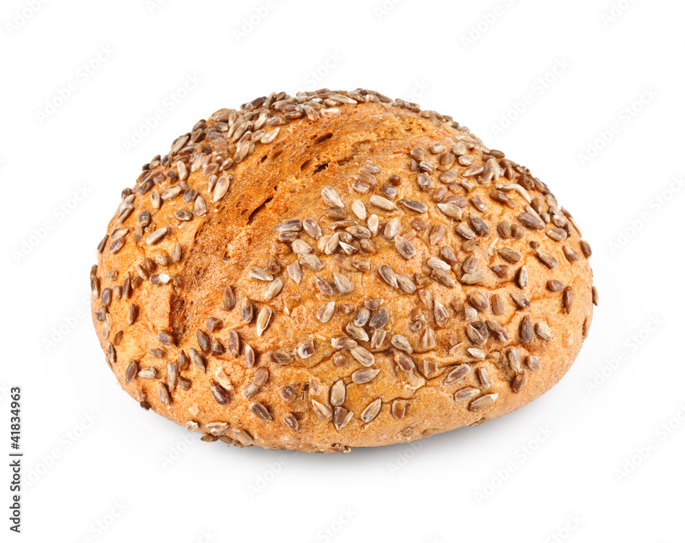 A loaf of homemade bread with sunflower seeds isolated on white A loaf of homemade bread with sunflower seeds isolated on white