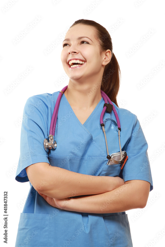Closeup portrait of a young female doctor smiling Closeup portrait of a young female doctor smiling