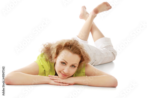 A young woman lying on the floor