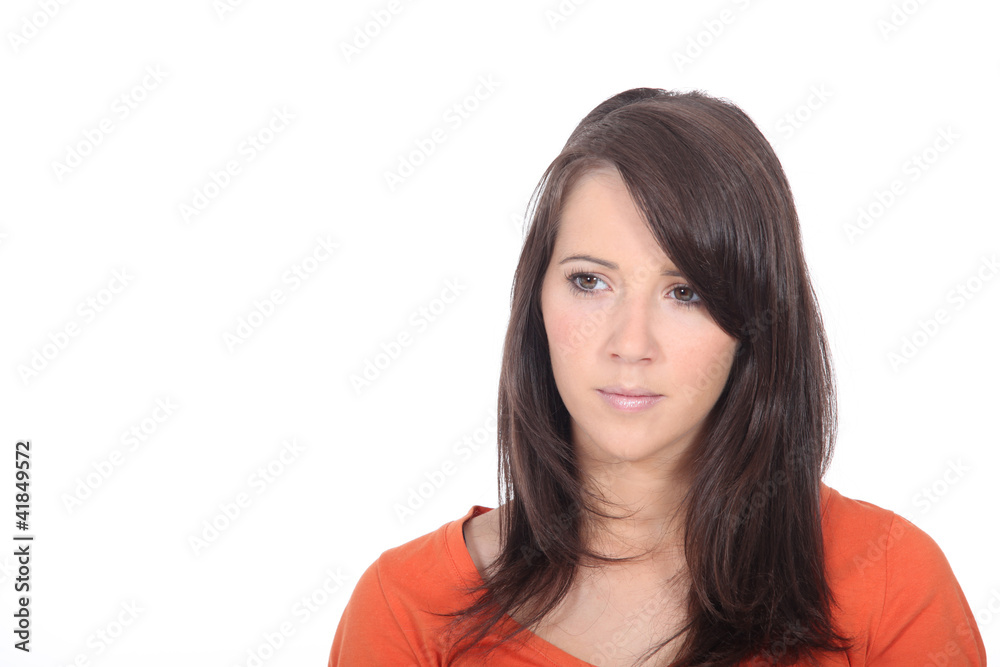 Portrait of brunette woman looking concerned Portrait of brunette woman looking concerned