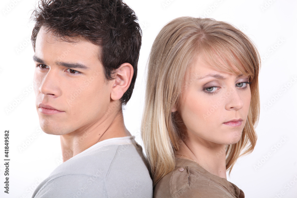 Couple stood back to back following argument Couple stood back to back following argument