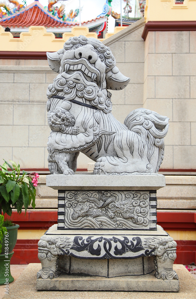 Chinese Lion stone statue in china temple in Thailand