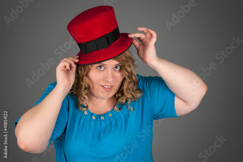 Quadro em tela smiling fat woman on gray background