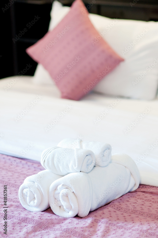 bath towels rolled and pillow on bed bath towels rolled and pillow on bed