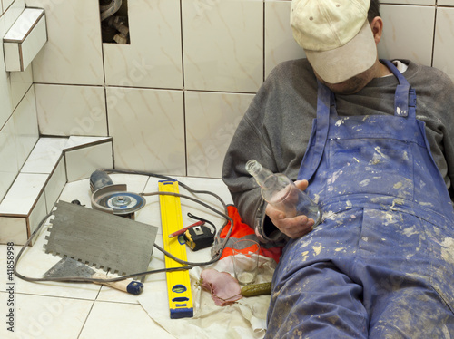 Принти на полотні Drunk worker sleeping in the bath