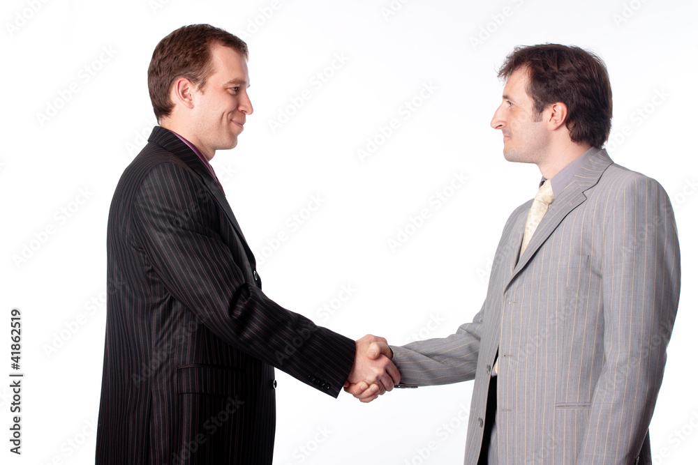 Close up of businessmen shaking hands