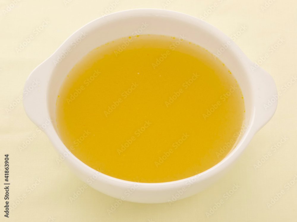 close up of a bowl of chicken broth close up of a bowl of chicken broth