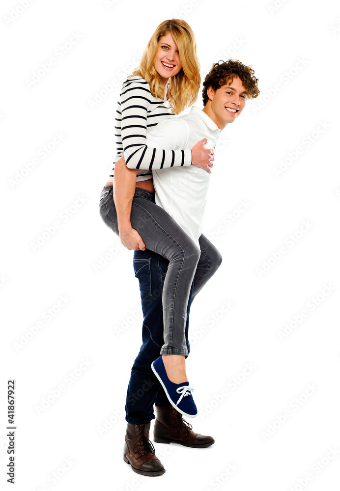 Boyfriend giving piggy ride to his girl Boyfriend giving piggy ride to his girl