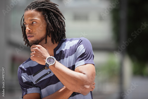 Man rubbing his chin