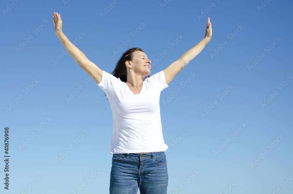 Happy cheerful woman with arms up Happy cheerful woman with arms up