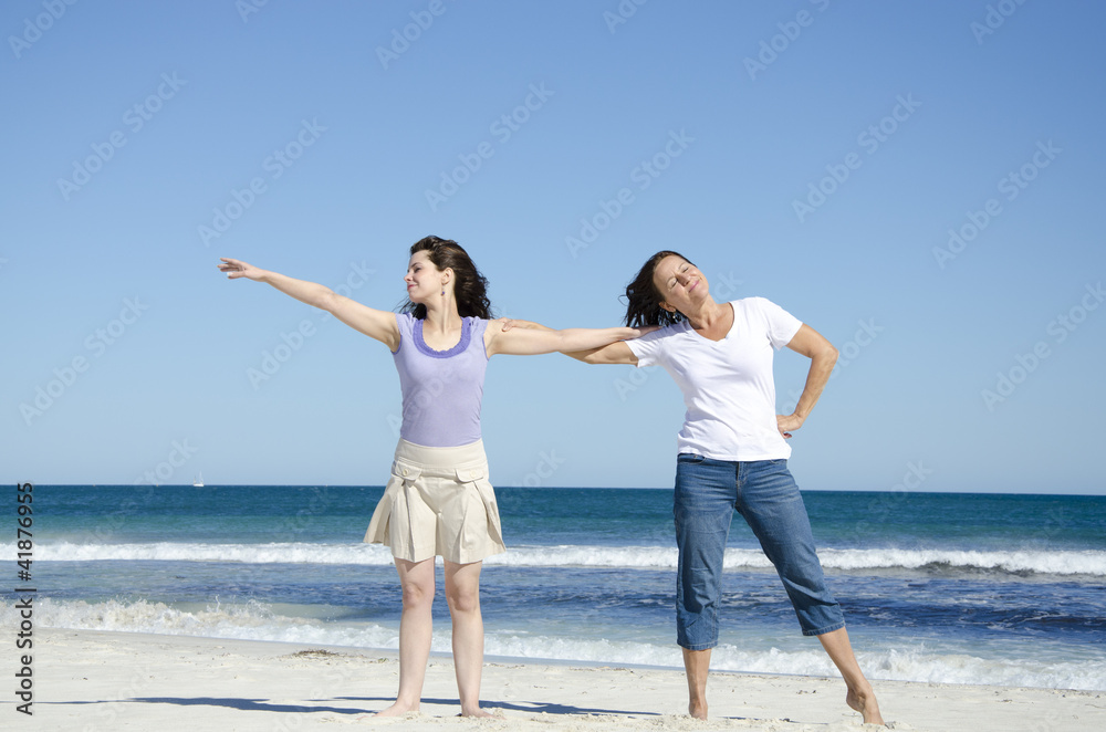 Two women having fun at the beach