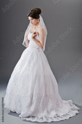 Bride in wedding dress in studio shooting