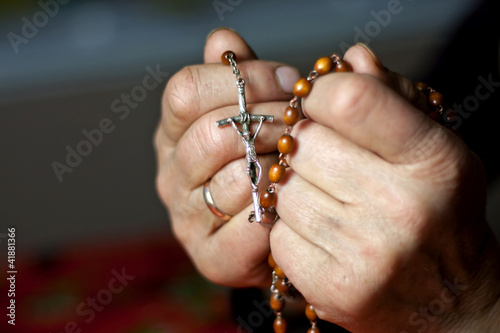 prayer old woman hands and rosary