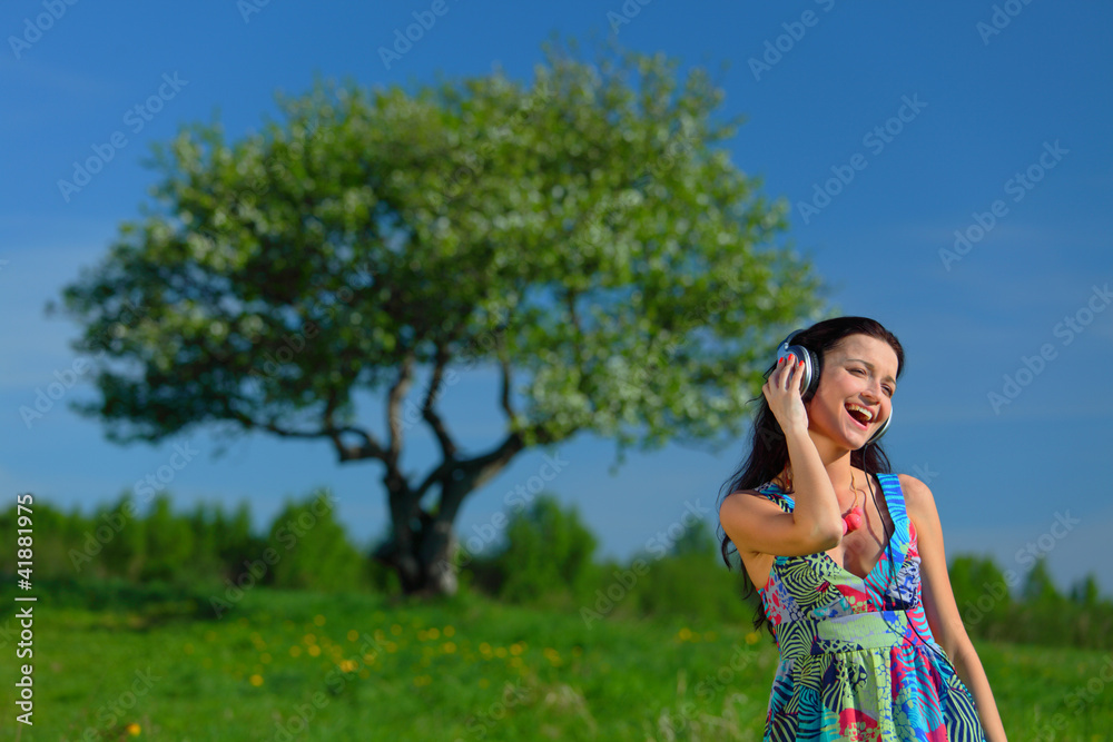 Young woman enjoying music