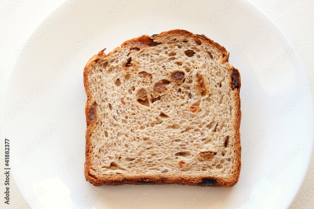 Raisin bread on plate Raisin bread on plate