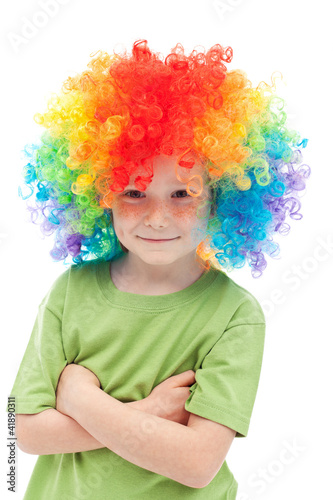 Little clown boy with colorful hair