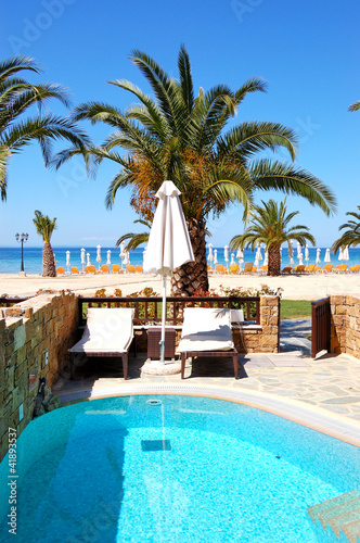 Swimming pool by luxury villa with beach view, Halkidiki, Greece © slava296
