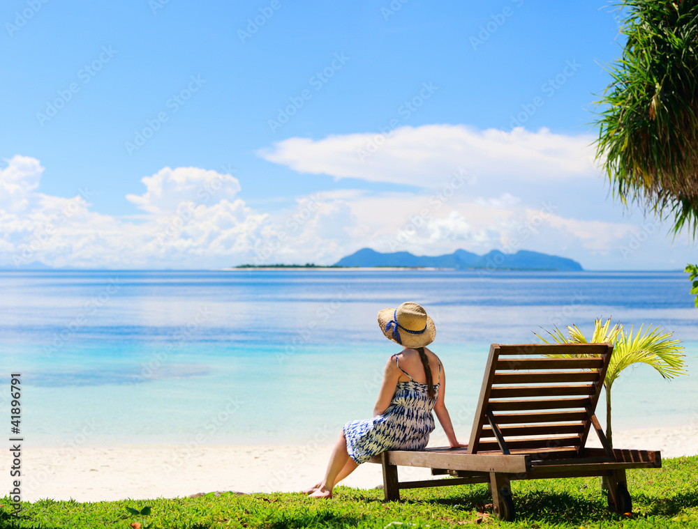 Fototapeta premium Young woman at beach