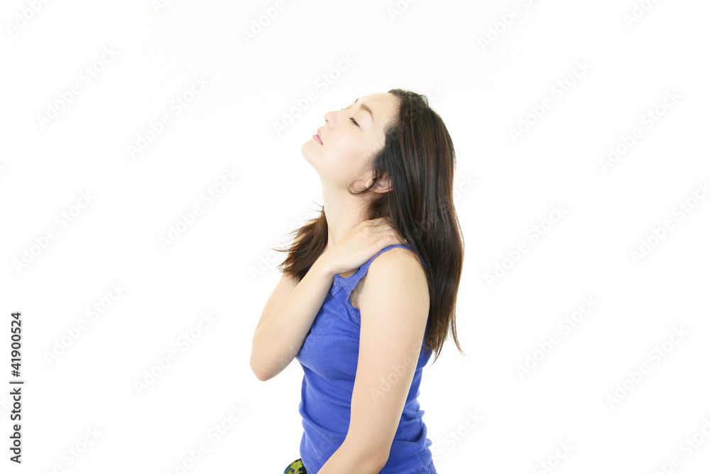 肩こりに悩む女性 肩こりに悩む女性