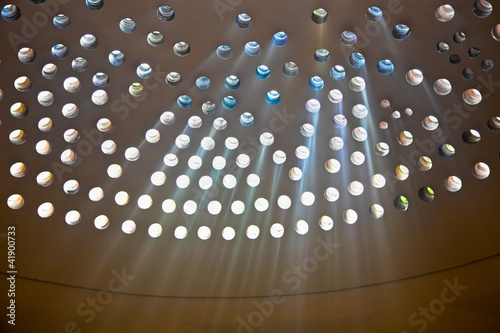 Light coming from holes in the roof of Turkish bath,  Israel photo