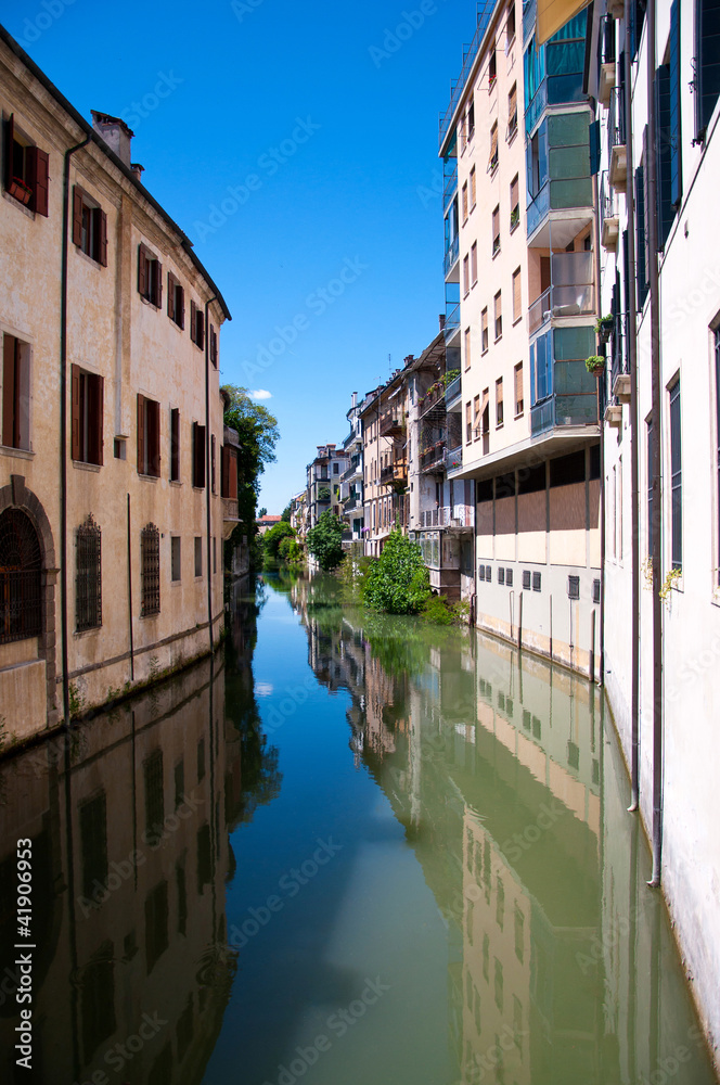Water canal with reflections in Padova