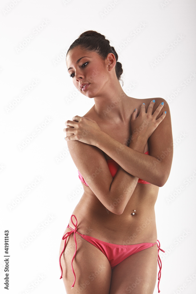 Fototapeta premium Beautiful Young Woman Wearing A Pink Bikini