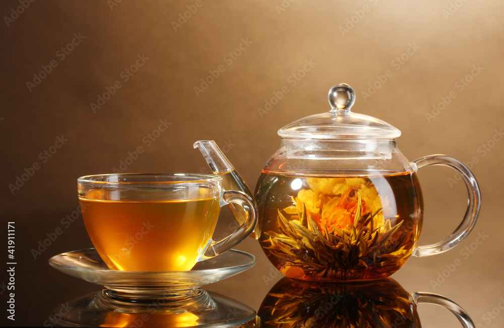 glass teapot and cup with exotic green tea