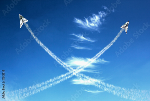 Two hundred dollars planes on cloudy sky and trace.