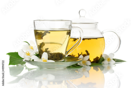 green tea with jasmine in cup and teapot isolated on white