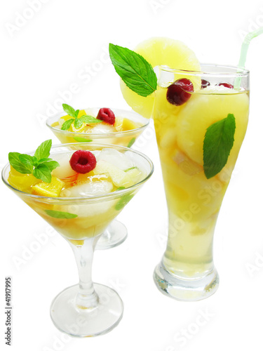 three punch cocktail drinks with fruit photo