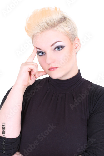 Thinking blonde woman in black