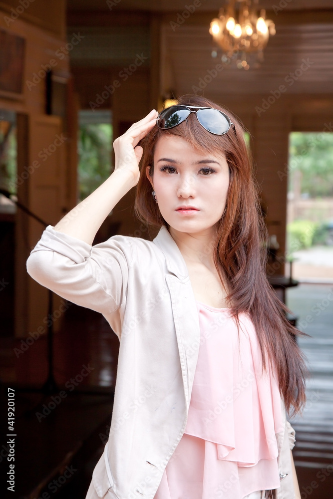 Asian woman with sun glasses of out door Asian woman with sun glasses of out door