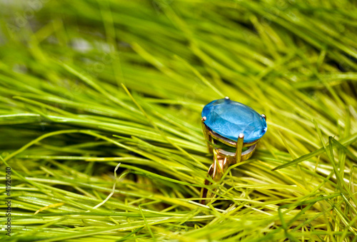 Gold ring with a blue topaz photo