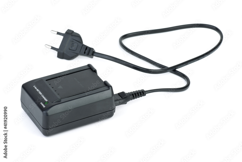 Lithium-ion battery inserted in charger Lithium-ion battery inserted in charger