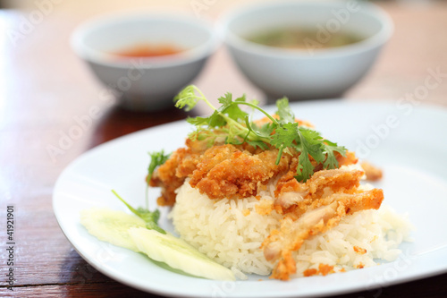 Thai food gourmet fried chicken with rice , khao mun kai tod in