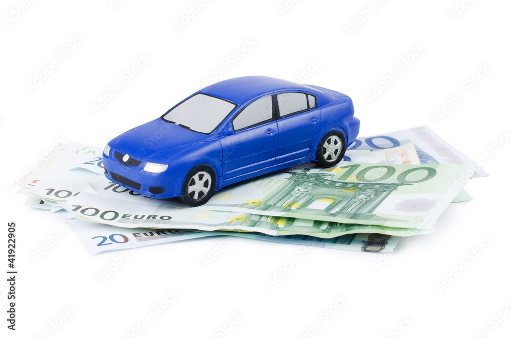 The toy car for euro banknotes isolated