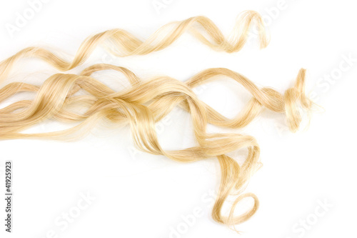 Curly blond hair isolated on white