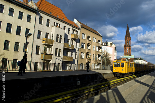 a metro train reaches gorlitzer station, berlin, germany photo