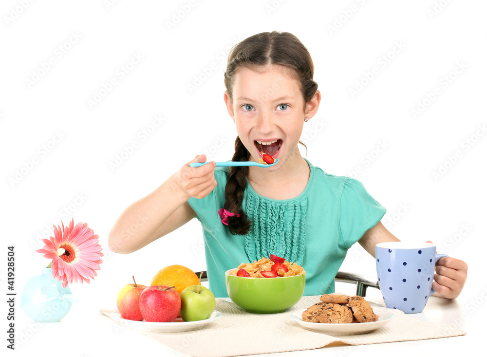 little beautiful girl have a breakfast on white background little beautiful girl have a breakfast on white background