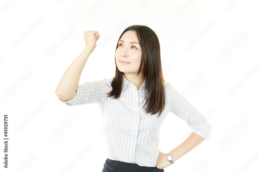 ガッツポーズをして喜ぶオフィスレディー ガッツポーズをして喜ぶオフィスレディー