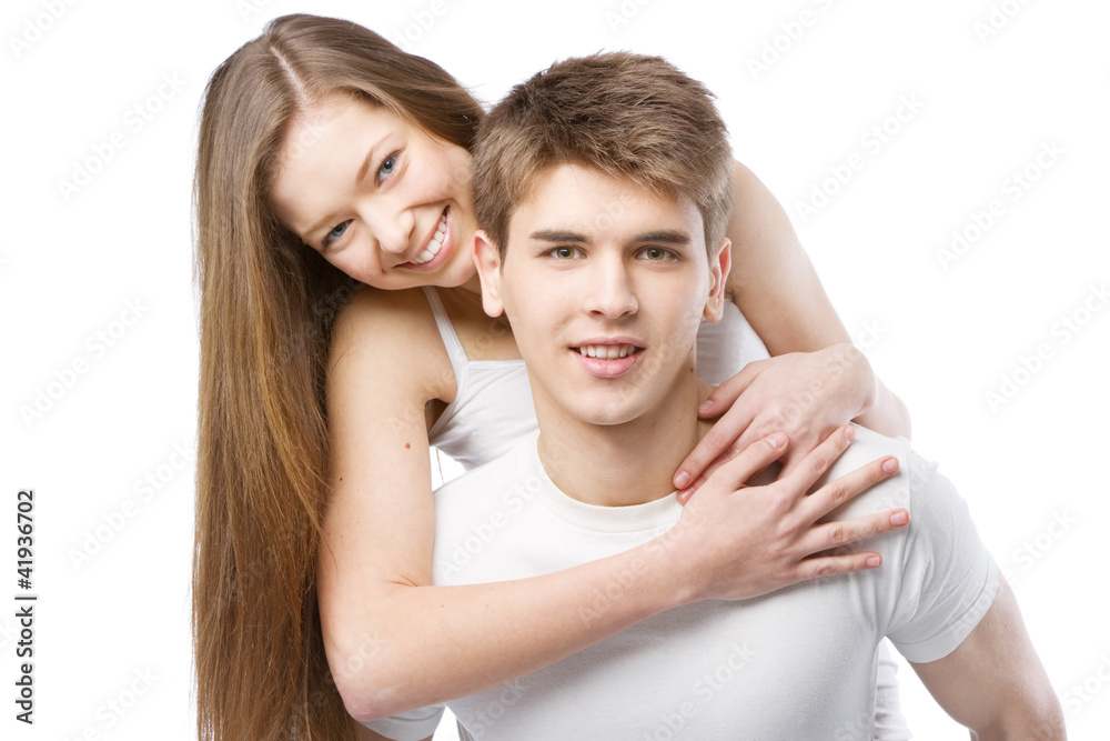 Young beautiful couple isolated on white background Young beautiful couple isolated on white background