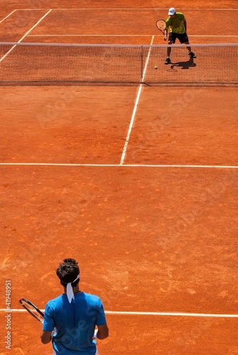Match de tennis sur terre battue