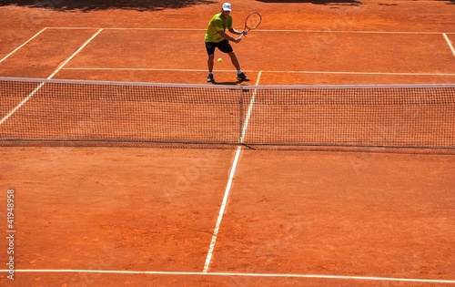 Match de tennis sur terre battue photo