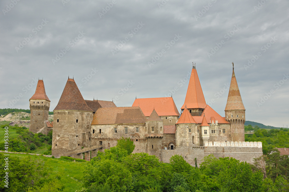 view of Huniad Castle (built 1315) on a cloudy day