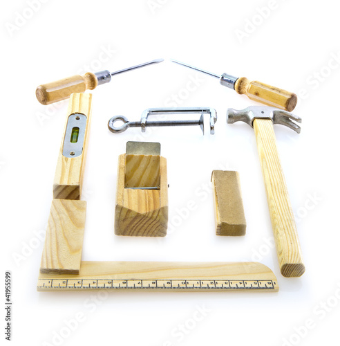 Selection of tools in the shape of a house, home improvement con