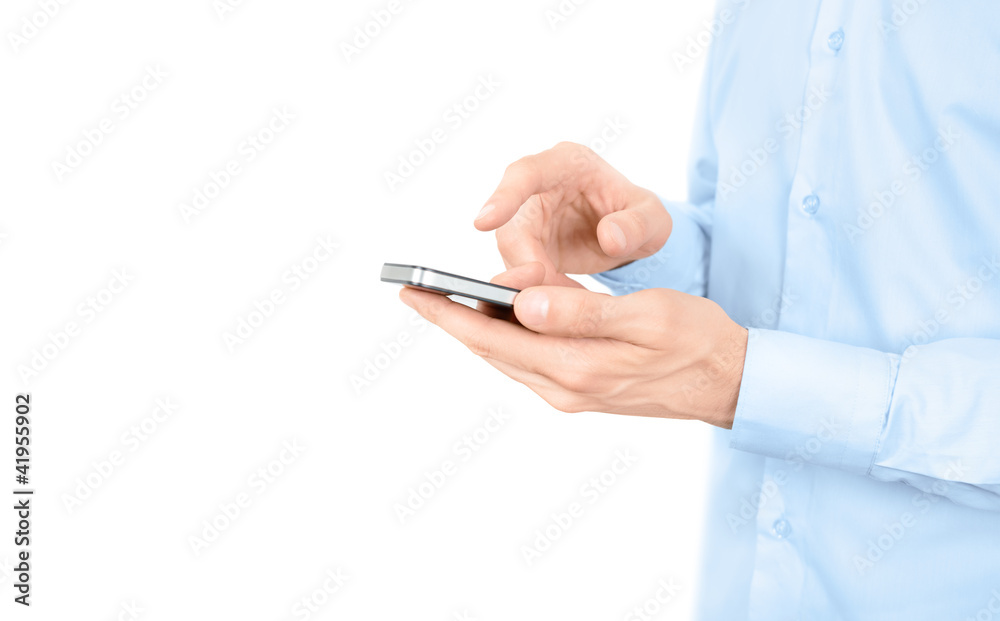 Man using a mobile phone isolated with copy space Man using a mobile phone isolated with copy space
